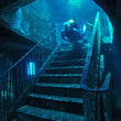 Load image into Gallery viewer, A diver descending the iconic staircase of the MV Karwela on a deep dive in Gozo.
