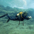 Load image into Gallery viewer, A diver practising the launch of an SMB during a PADI DSMB specialty dive in Malta
