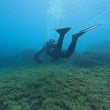 Load image into Gallery viewer, A diver swims away from the camera towards the surface on a fun dive in Bugibba, Saint Paul's Bay, Malta
