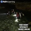 Load image into Gallery viewer, Divers on the surface with torches before a night dive on a local Maltese reef
