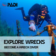 Load image into Gallery viewer, A diver swimming along the outside of the p29 wreck in Cirkewwa, Malta, following a line as part of the wreck diver course
